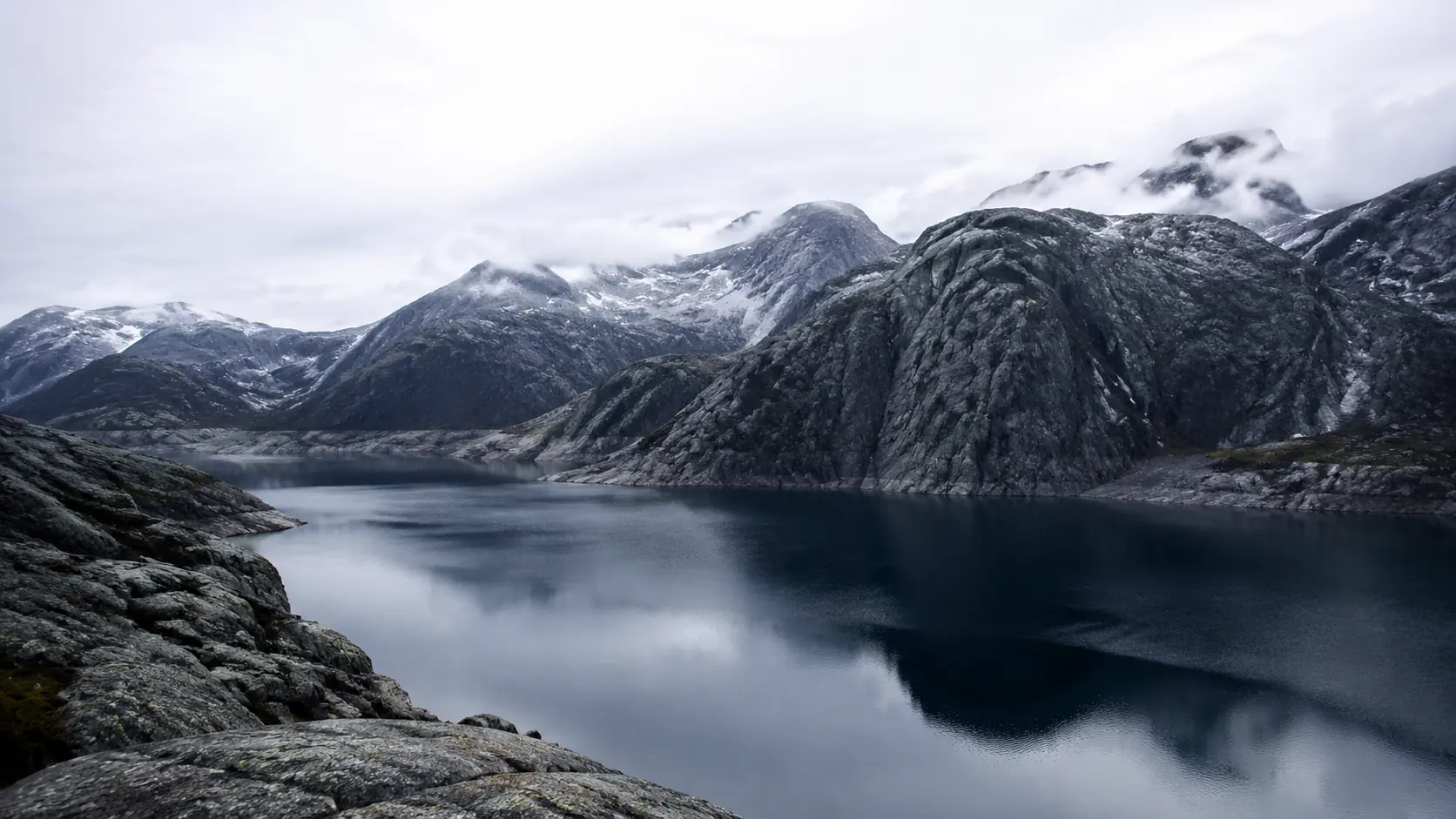 Mountain landscape and water representing the environmental systems product recovery must protect
